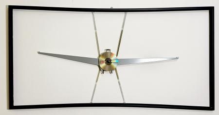 Campo-Volo, 2023, elementi metallici vari di recupero, cd rovinato, molle in cornice di magazzino 120 x 60 cm