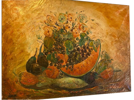 Natura morta, olio su tela, 100x70 cm, € 8.000. Il tripudio di una tavola in festa rimanda lo sguardo ed il palato a sapori lontani.
